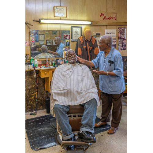 Mr. Elwood Burrow at Economy Barber Shop